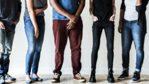 Multicultural group frozen for hours mid-greeting because no one certain which to use